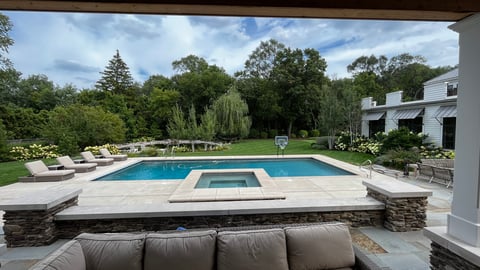 Back of home with pool and spa rogers