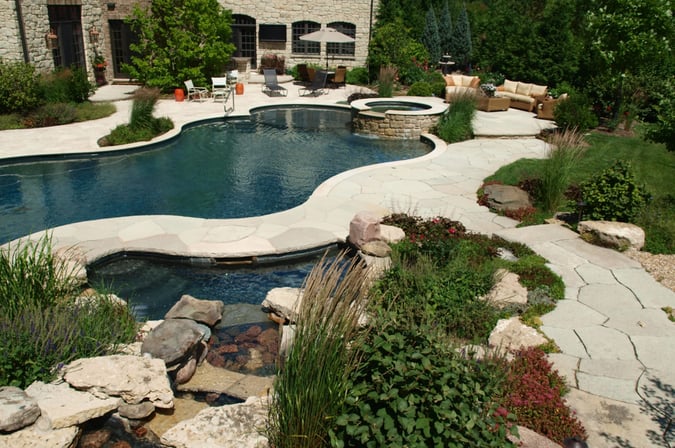 poolside garden with large paver patio