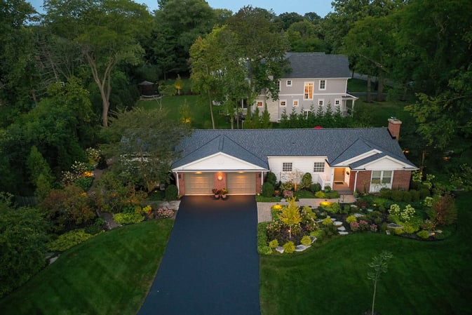 front of house with landscape lighting 