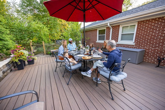 residential landscape design family dining on deck 5