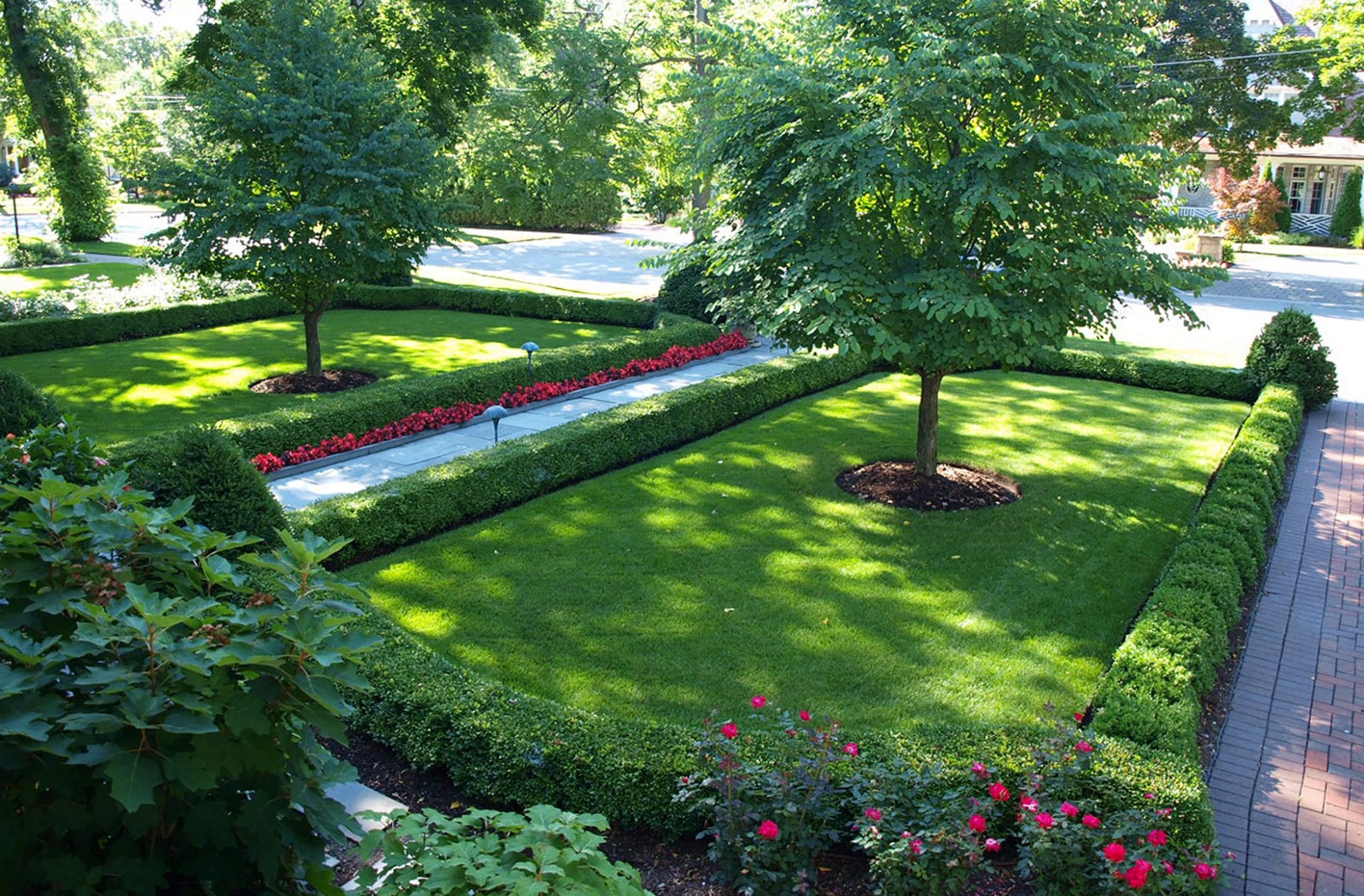 front yard garden with green grass 