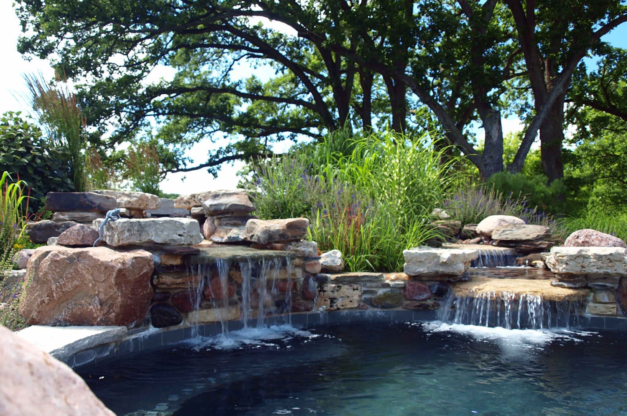 poolside garden with water feature