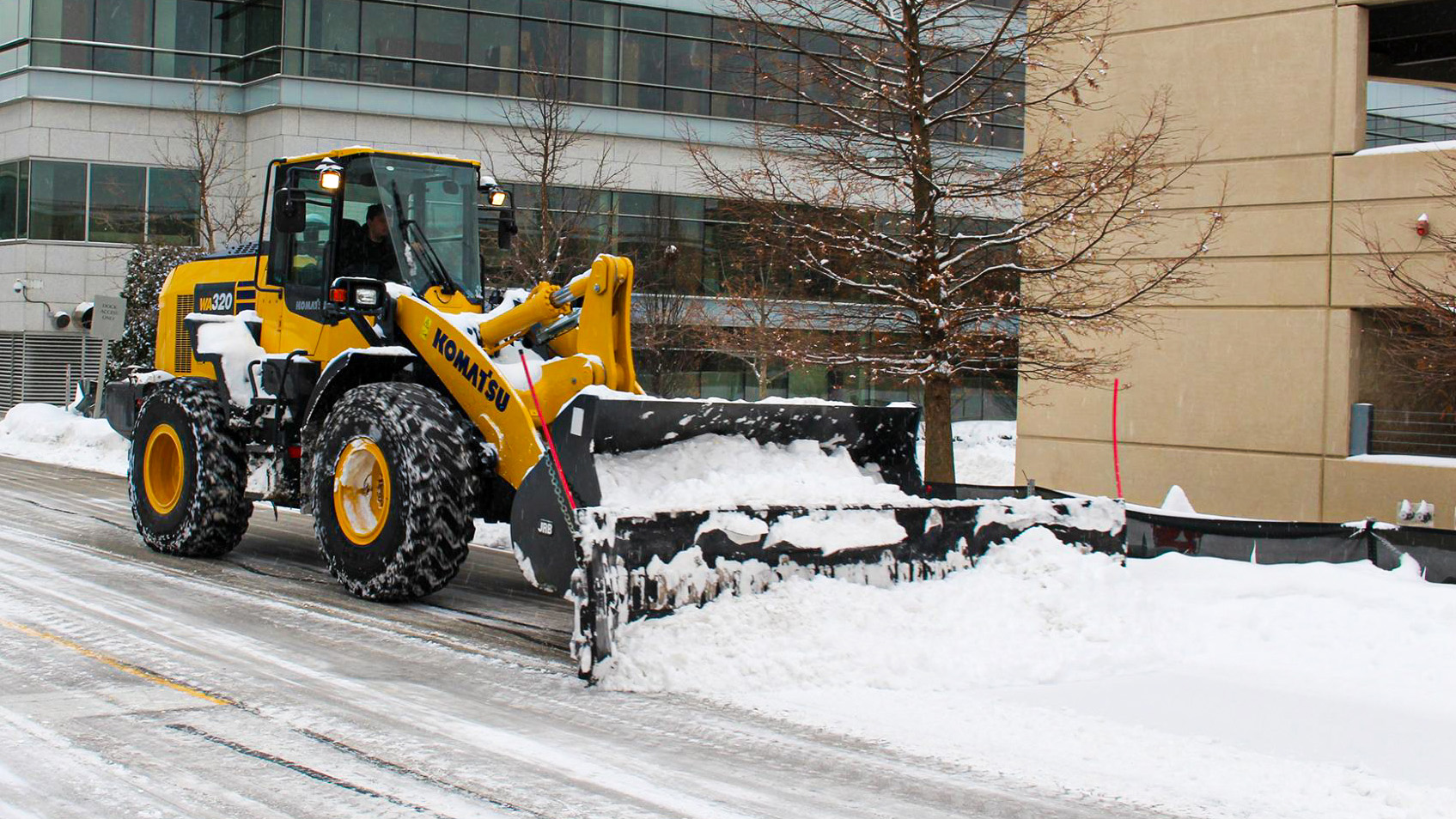 snow plow plowing snow at Condell